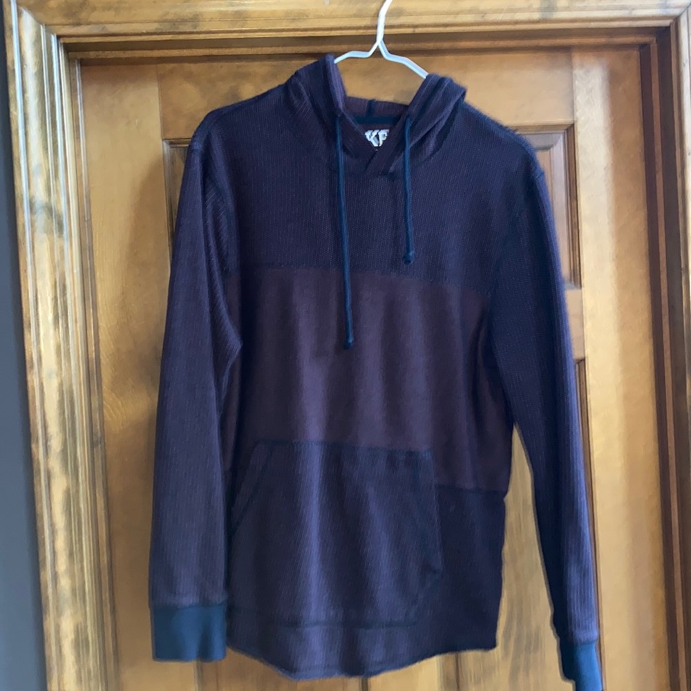 Long sleeve sweater, sweatshirt-type material. Worn twice, just don’t wear it
